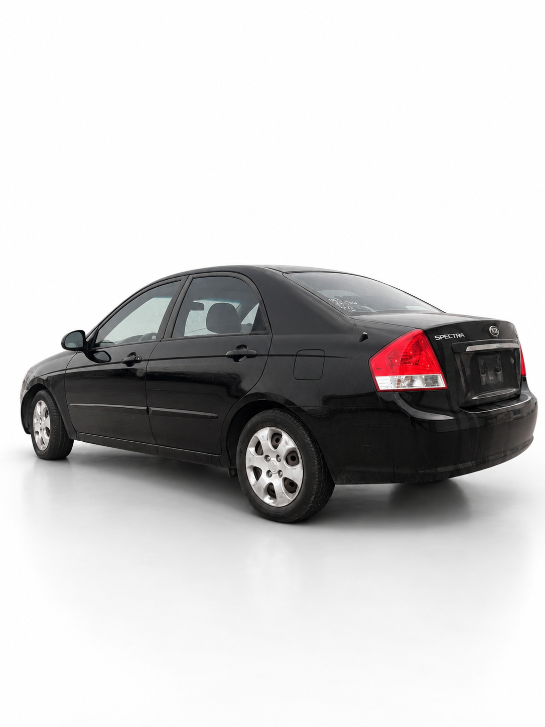 2007 Kia Spectra EX rear passenger-side angle on white background