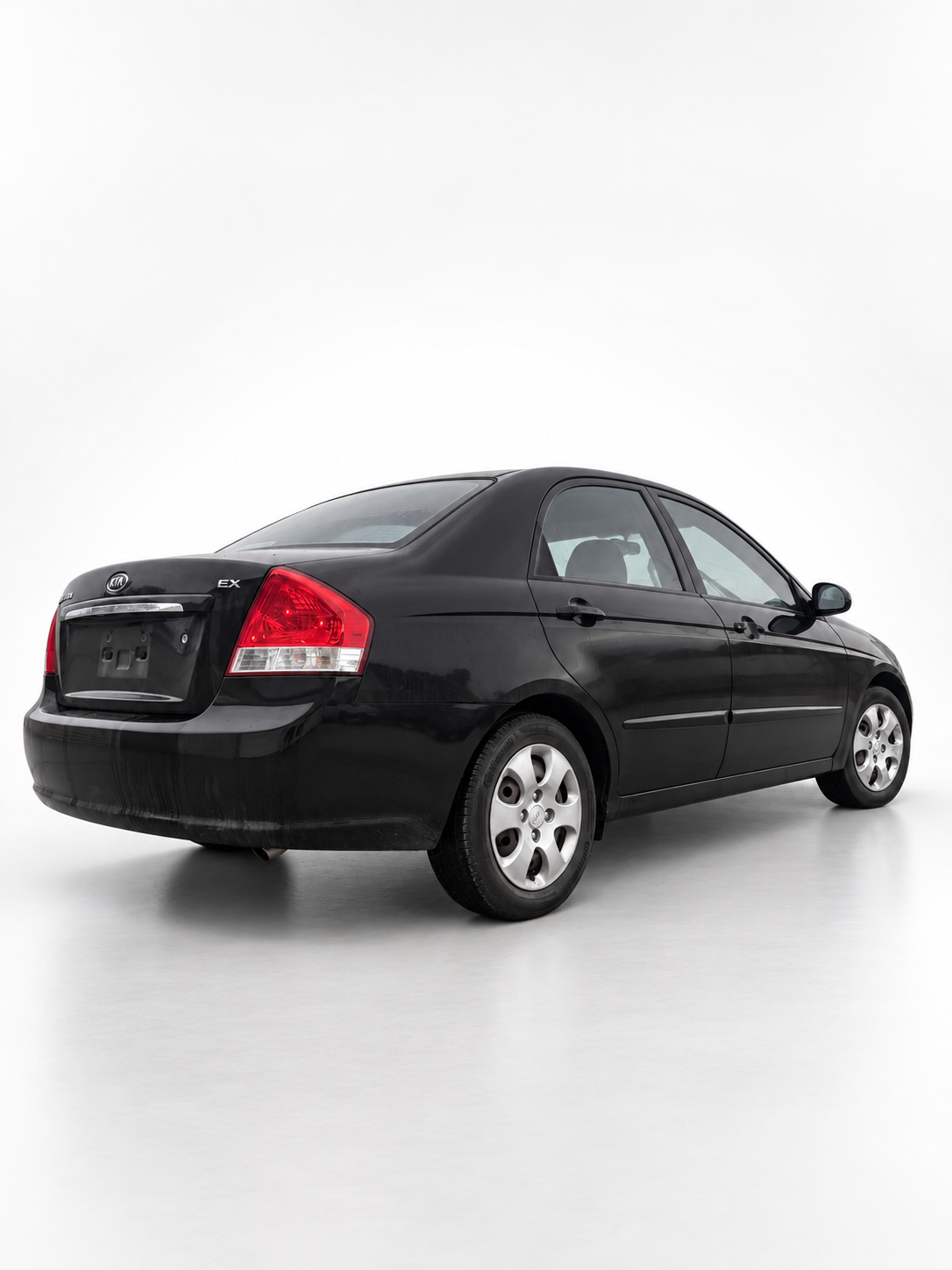 2007 Kia Spectra EX rear driver-side angle on white background